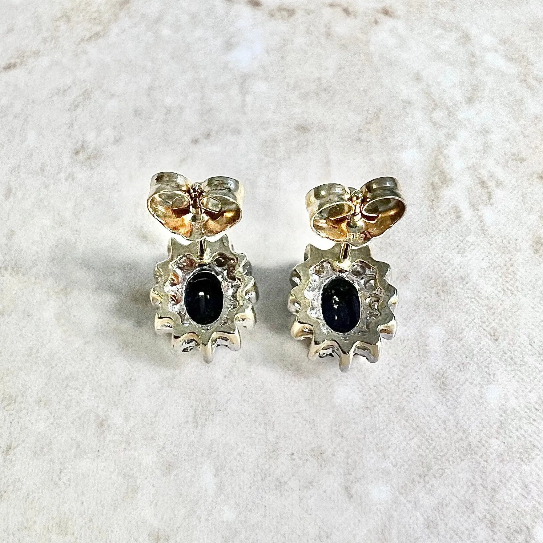 14 Karat Two-Tone Oval Blue Sapphire & Diamond Halo Stud Earrings