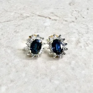 14 Karat Two-Tone Oval Blue Sapphire & Diamond Halo Stud Earrings