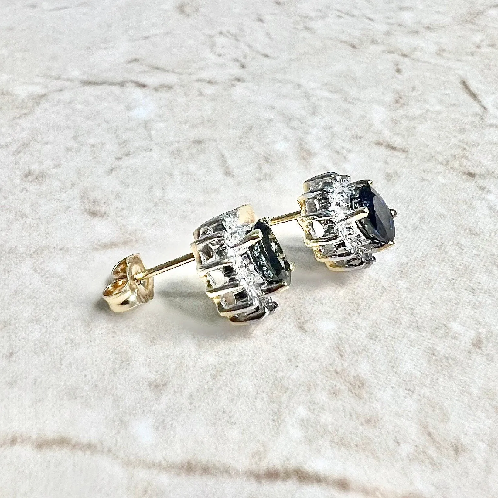 14 Karat Two-Tone Oval Blue Sapphire & Diamond Halo Stud Earrings