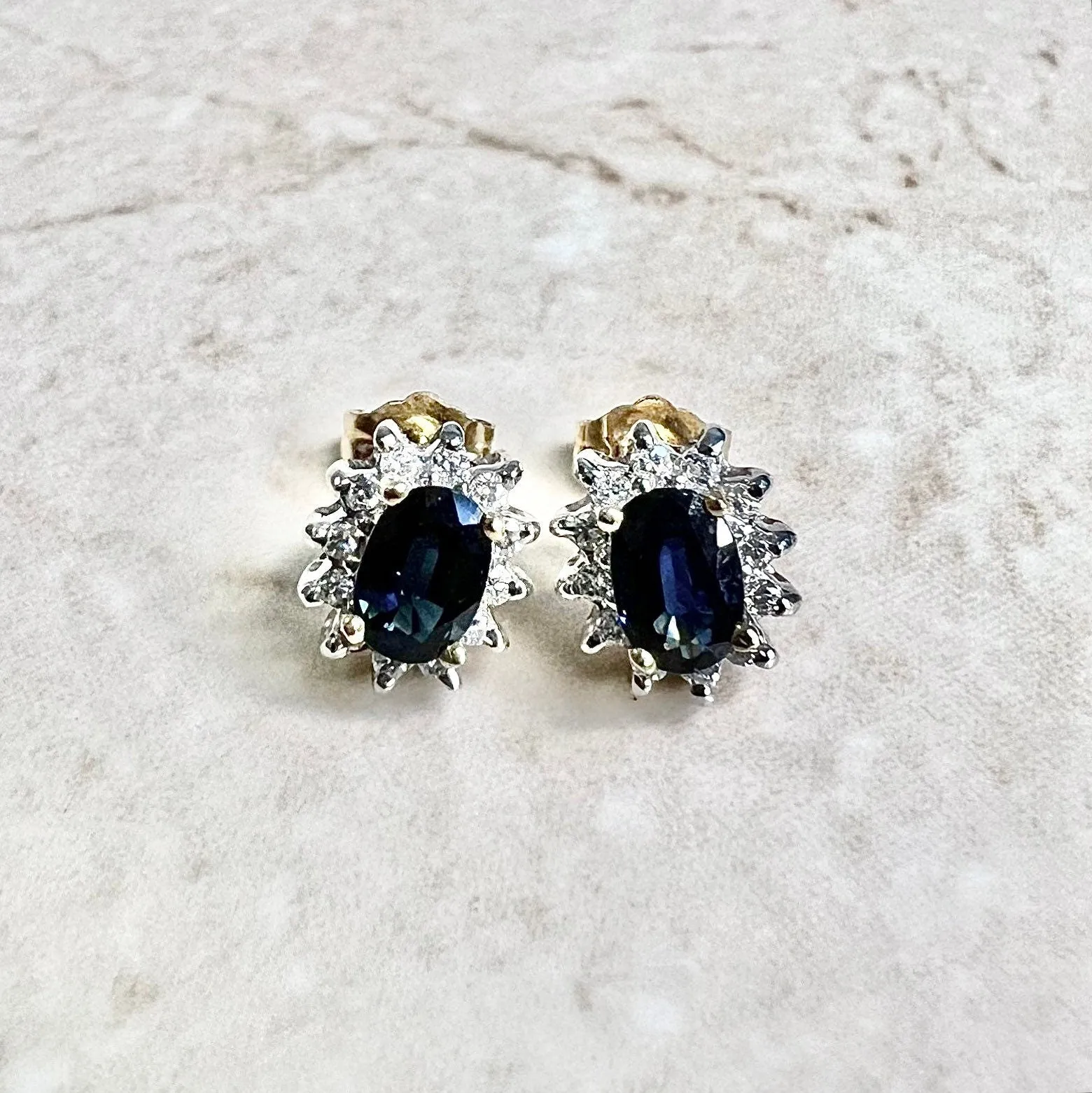 14 Karat Two-Tone Oval Blue Sapphire & Diamond Halo Stud Earrings