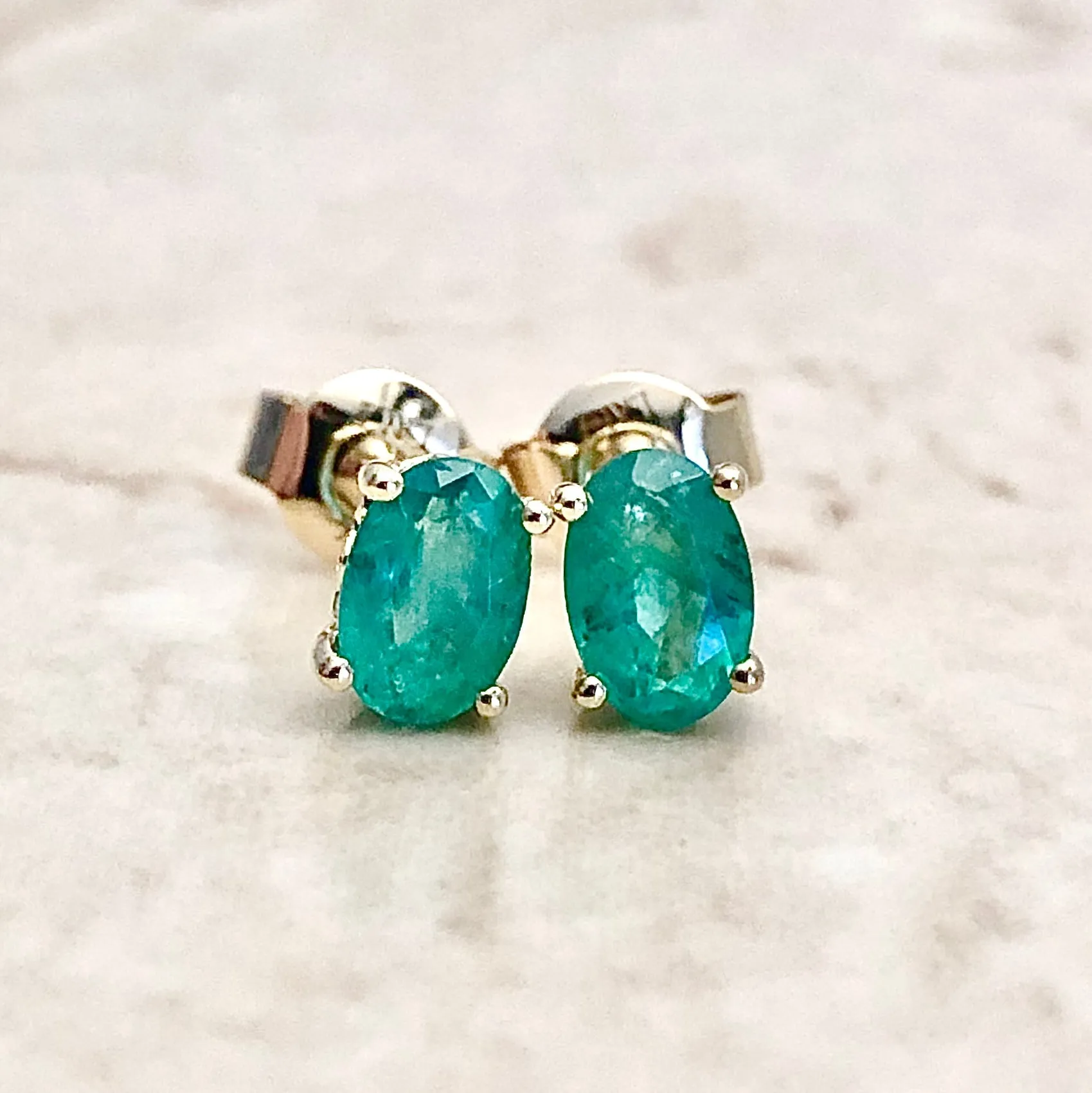 14 Karat Yellow Gold May Birthstone Oval Emerald Stud Earrings