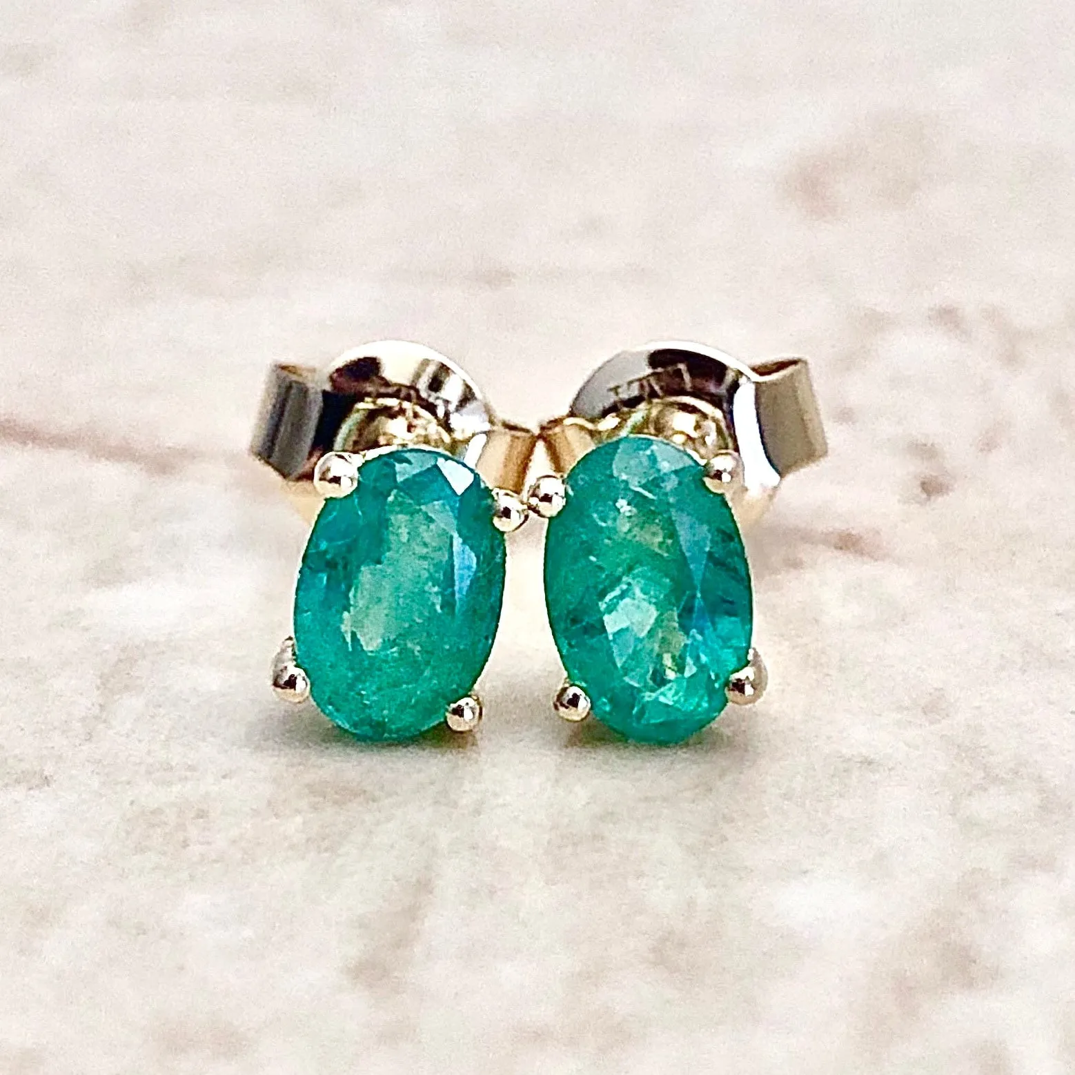 14 Karat Yellow Gold May Birthstone Oval Emerald Stud Earrings