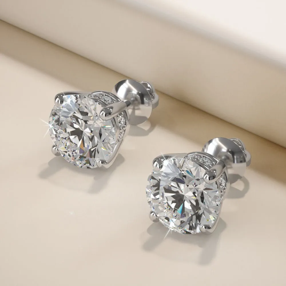 Brilliant Stud Earrings with Side Diamonds Diamond with 2.11 ct. (2X1.00 ct. center diamonds)