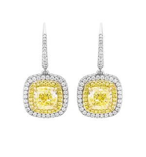 GIA Certified Earrings with 3 carat each Fancy Light Yellow Cushion Cut Diamonds