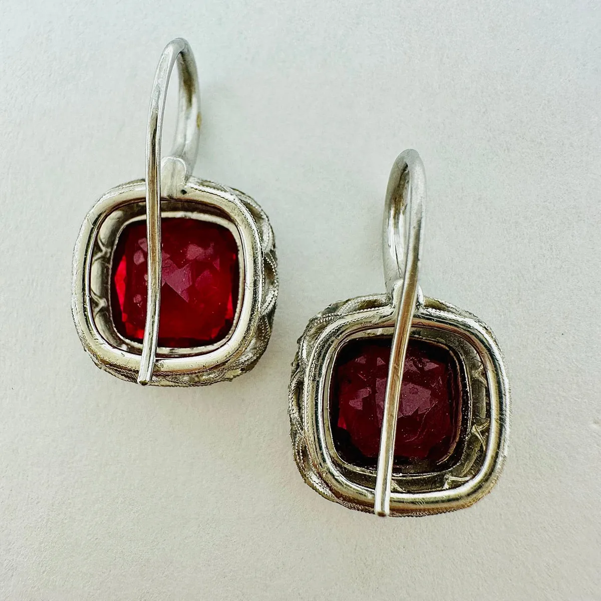 Platinum Double Halo Dangle Earrings with Bezel Set Rubellites