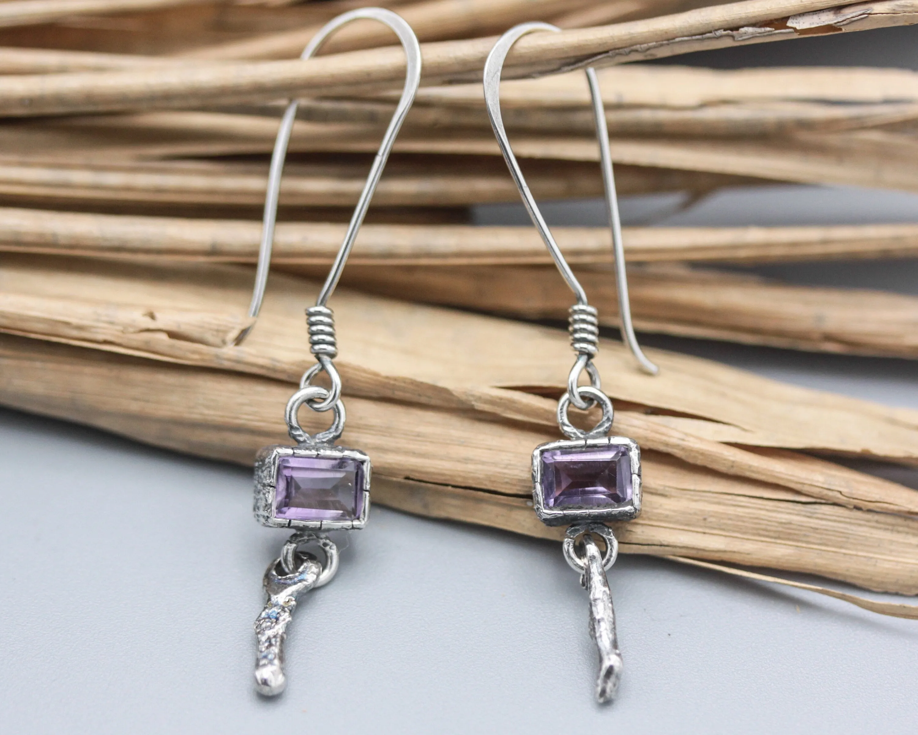 Princess cut Amethyst earrings in silver bezel setting with silver sticks and hooks style on the top