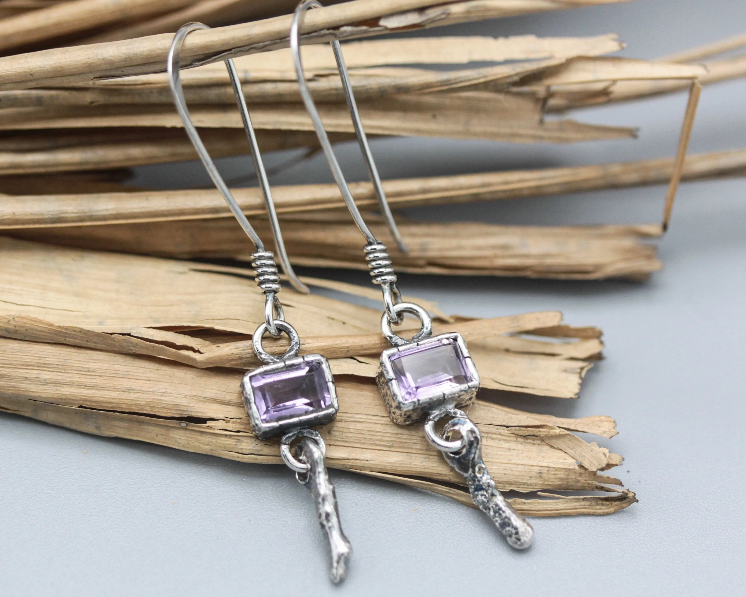 Princess cut Amethyst earrings in silver bezel setting with silver sticks and hooks style on the top