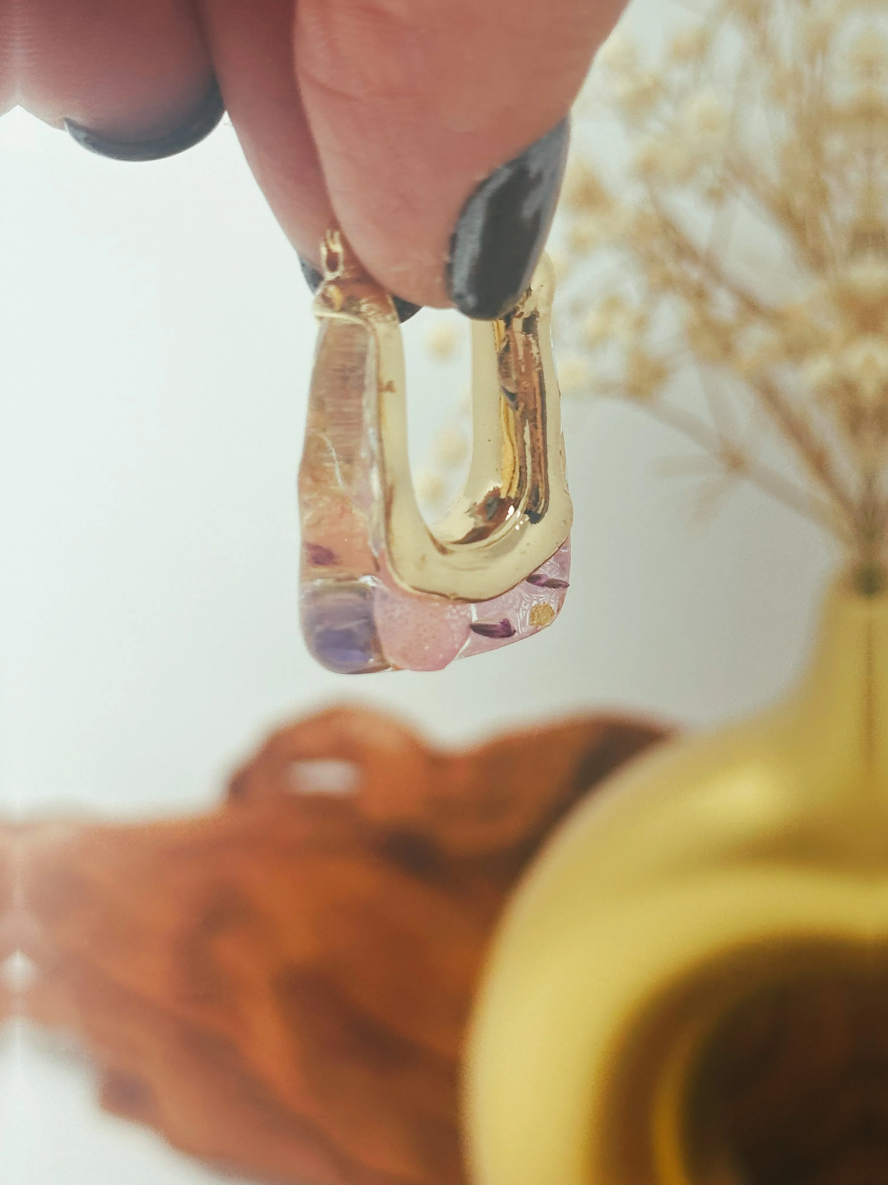 Resin hoops with real pressed pink and purple flowers inside
