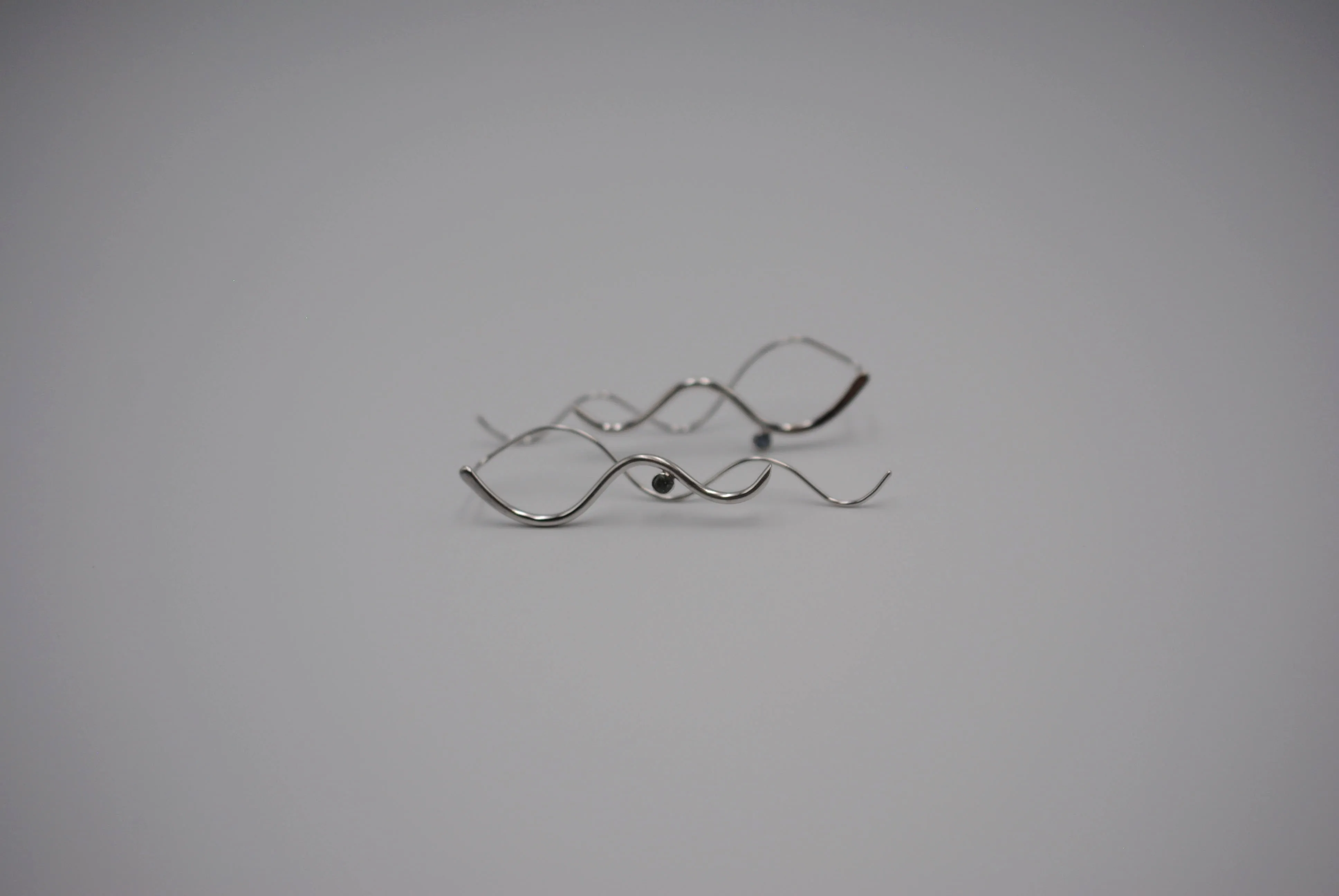 Sapphire Earrings: Infinity, Round Cut, Rhodium Finished