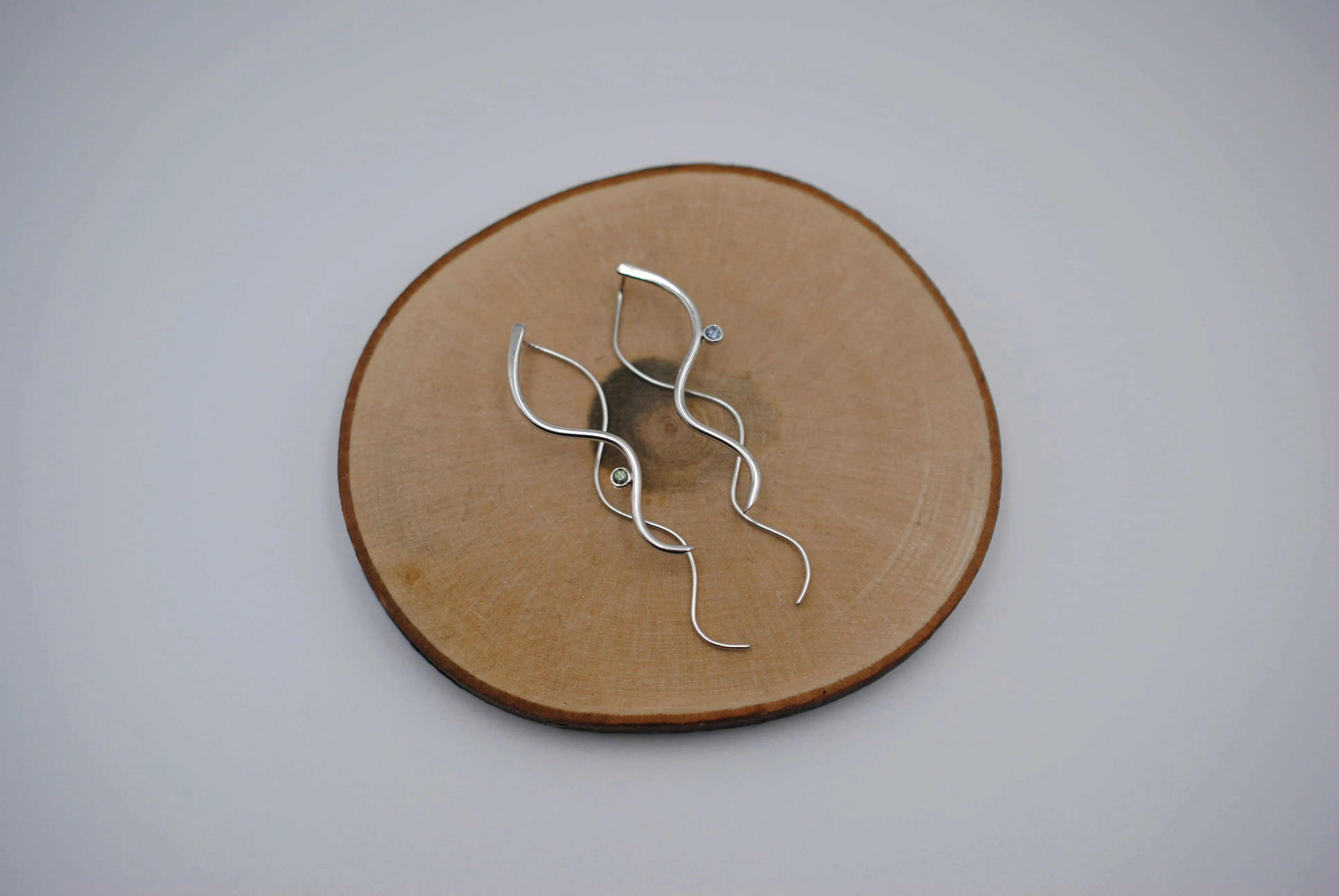 Sapphire Earrings: Infinity, Round Cut, Rhodium Finished