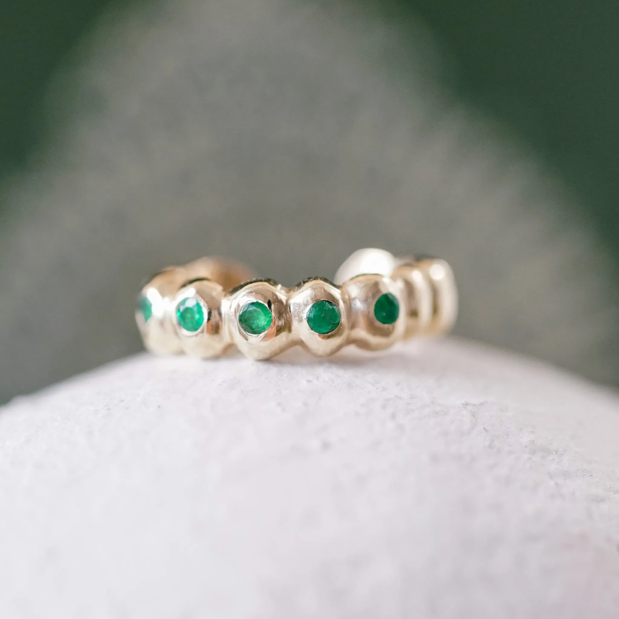 Scalloped gold ear cuff with Emeralds