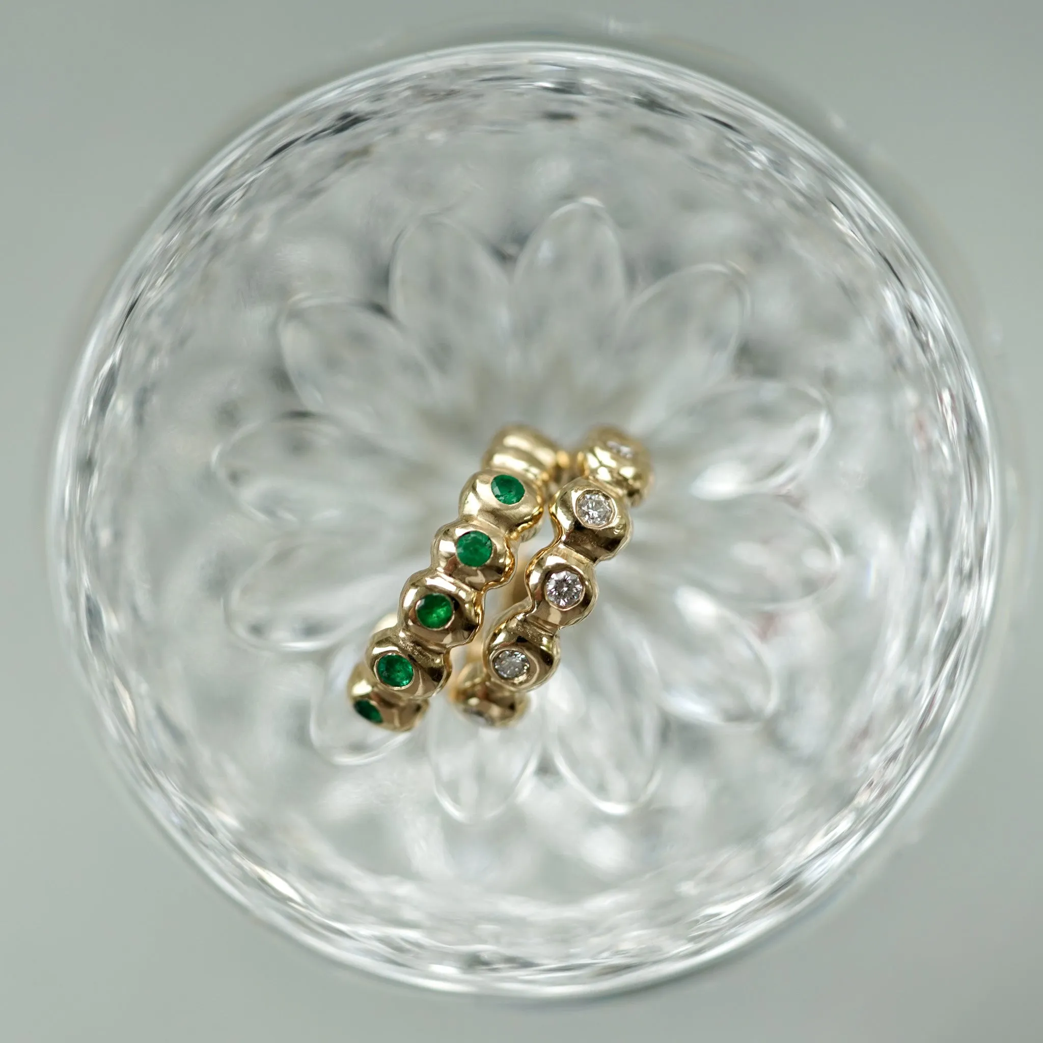Scalloped gold ear cuff with Emeralds
